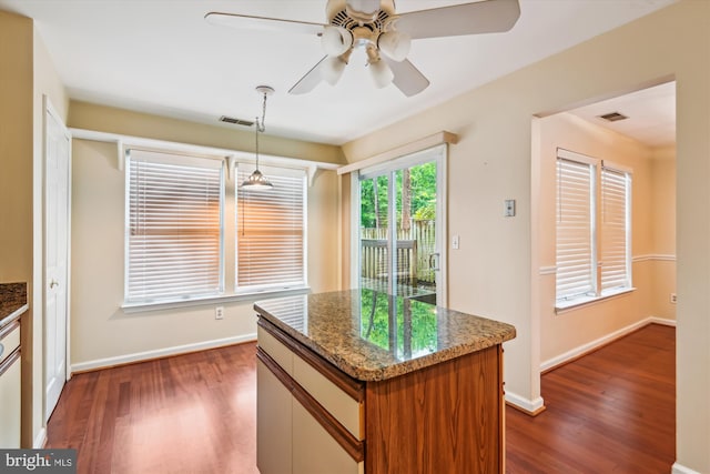 8 Ashford Ct, Annapolis, MD 21403 - kitchen with a ceiling fan, dark wood-style floors, decorative light fixtures, baseboards, and a center island