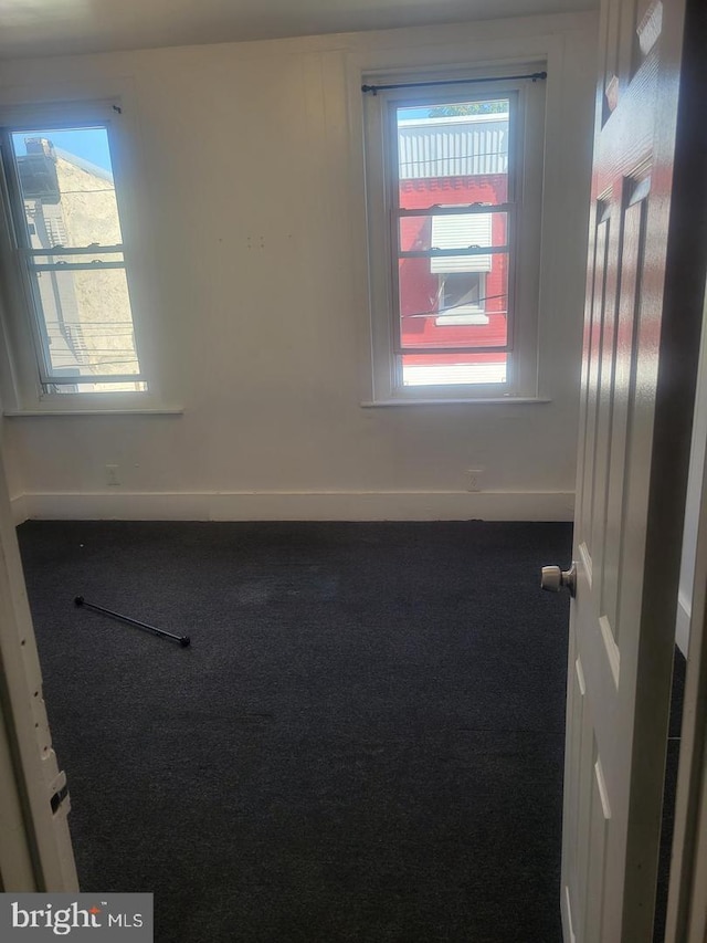2860 N Palethorp St, Philadelphia, PA 19133 - empty room with carpet floors and baseboards