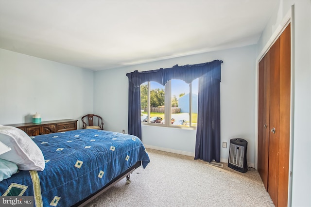 1650 Woodtree Ct E, Annapolis, MD 21409 - bedroom with carpet, baseboards, and a closet