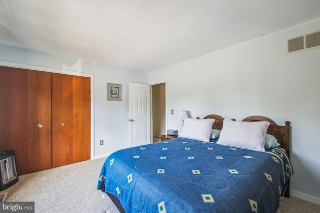 1650 Woodtree Ct E, Annapolis, MD 21409 - bedroom with carpet floors, a closet, and baseboards