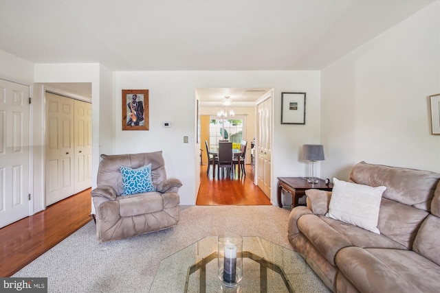 1650 Woodtree Ct E, Annapolis, MD 21409 - living room featuring a chandelier and wood finished floors