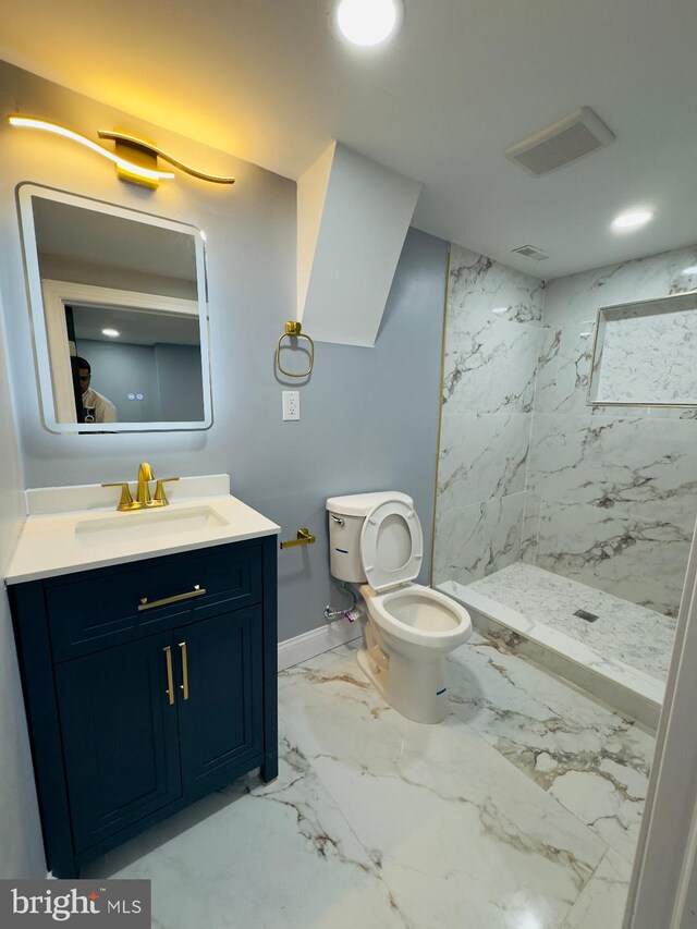 3203 W Allegheny Ave, Philadelphia, PA 19132 - bathroom with vanity, a marble finish shower, toilet, marble finish floors, and baseboards