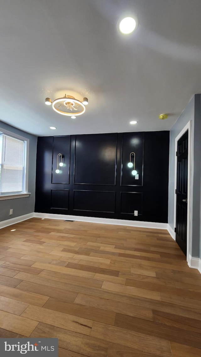 3203 W Allegheny Ave, Philadelphia, PA 19132 - spare room featuring baseboards, wood finished floors, and recessed lighting