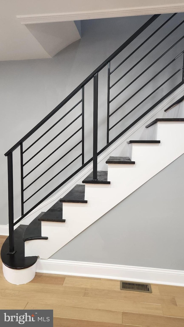 3203 W Allegheny Ave, Philadelphia, PA 19132 - staircase with wood finished floors and baseboards
