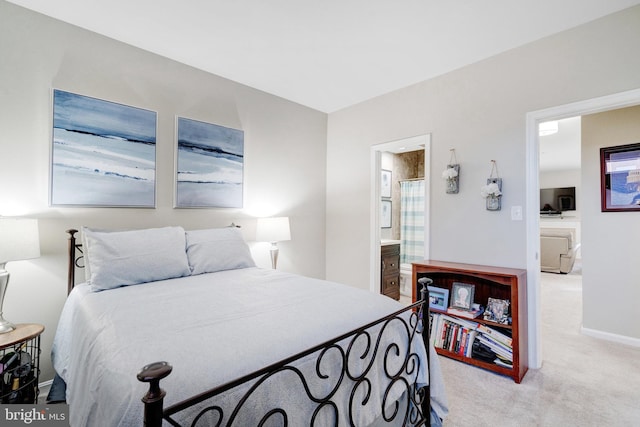 6914 Ellingham Cir Unit C, Alexandria, VA 22315 - bedroom with light colored carpet and ensuite bath