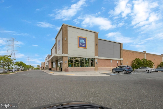 6914 Ellingham Cir Unit C, Alexandria, VA 22315 - view of building exterior featuring uncovered parking