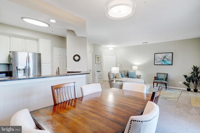 6914 Ellingham Cir Unit C, Alexandria, VA 22315 - dining space with light colored carpet and baseboards