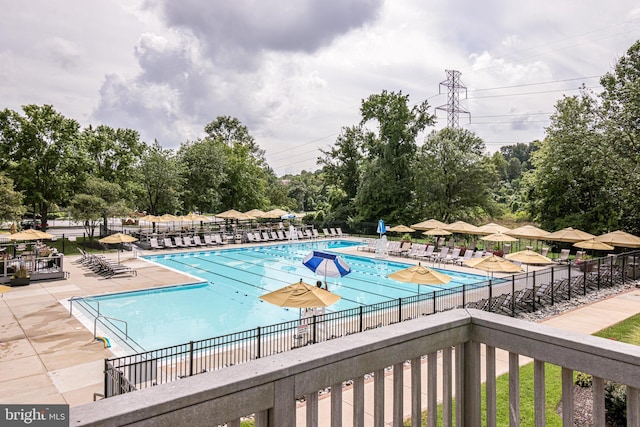 6914 Ellingham Cir Unit C, Alexandria, VA 22315 - community pool with a patio and view of scattered trees