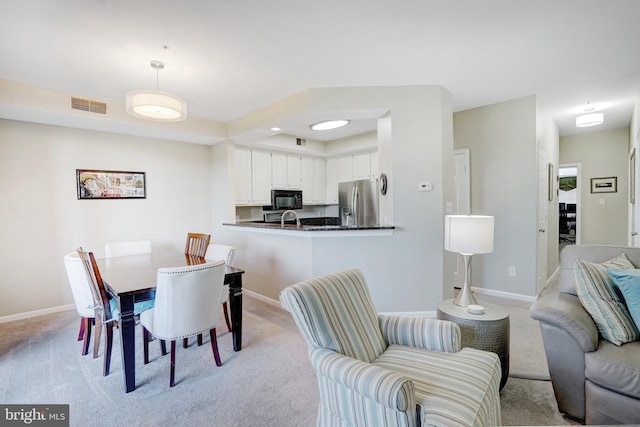 6914 Ellingham Cir Unit C, Alexandria, VA 22315 - dining space with light carpet