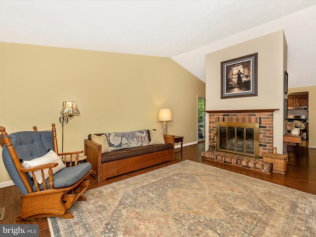 4310 Zircon Rd, Middletown, MD 21769 - living area with wood finished floors, baseboards, vaulted ceiling, and a fireplace