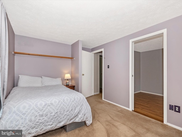 4310 Zircon Rd, Middletown, MD 21769 - bedroom featuring light carpet, baseboards, and a textured ceiling
