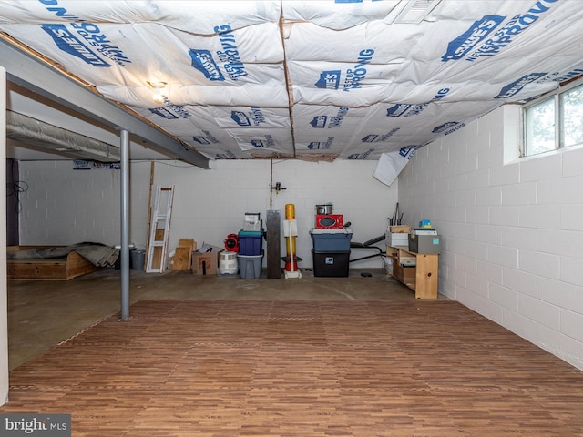 4310 Zircon Rd, Middletown, MD 21769 - basement with wood finished floors and concrete block wall