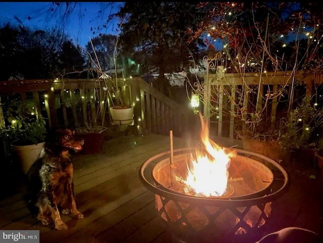 4310 Zircon Rd, Middletown, MD 21769 - deck at night with an outdoor fire pit