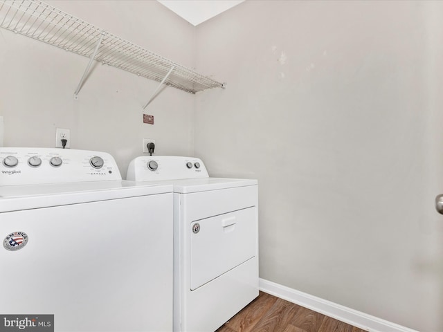 11044 Cross Fields Dr, Waynesboro, PA 17268 - laundry area featuring washer and clothes dryer and wood finished floors