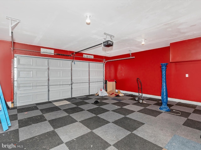 11044 Cross Fields Dr, Waynesboro, PA 17268 - garage featuring a garage door opener and baseboards