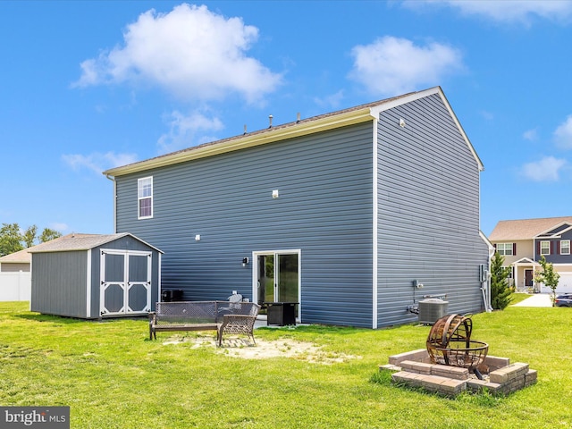 11044 Cross Fields Dr, Waynesboro, PA 17268 - back of house featuring a storage shed and an outdoor fire pit