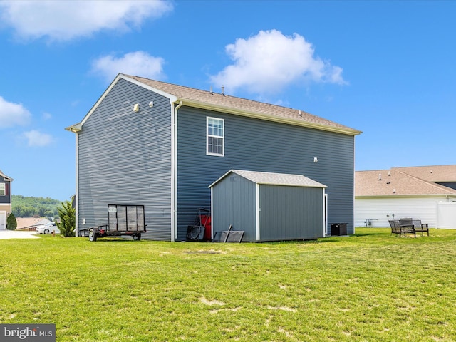 11044 Cross Fields Dr, Waynesboro, PA 17268 - rear view of house featuring a lawn and a storage unit