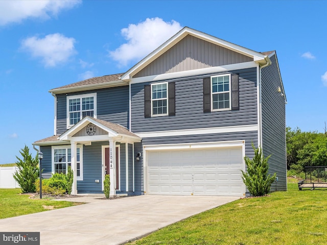 11044 Cross Fields Dr, Waynesboro, PA 17268 - view of front of home with concrete driveway, a garage, and a front yard