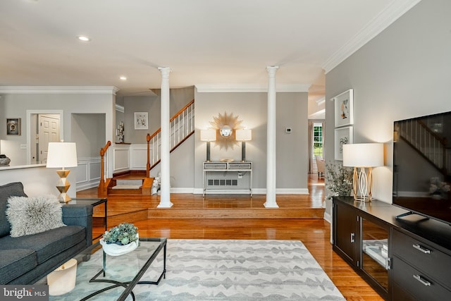 201 Ivystone Dr, Downingtown, PA 19335 - living room featuring ornate columns, crown molding, light wood-type flooring, stairway, and recessed lighting