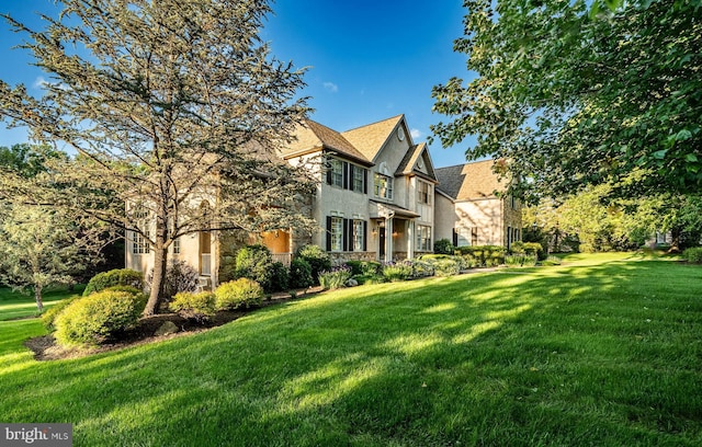 201 Ivystone Dr, Downingtown, PA 19335 - view of front of home with stone siding and a front lawn