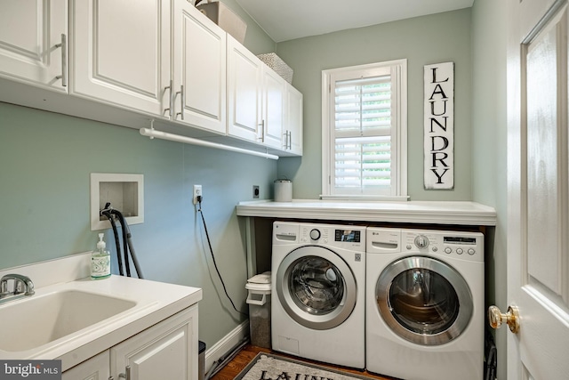 201 Ivystone Dr, Downingtown, PA 19335 - washroom featuring cabinet space, washing machine and clothes dryer, and wood finished floors