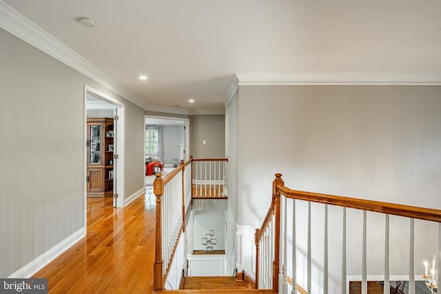 201 Ivystone Dr, Downingtown, PA 19335 - corridor with an upstairs landing, wood finished floors, ornamental molding, recessed lighting, and baseboards