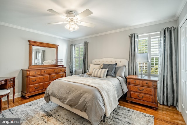201 Ivystone Dr, Downingtown, PA 19335 - bedroom featuring multiple windows, light wood-style flooring, ornamental molding, and ceiling fan