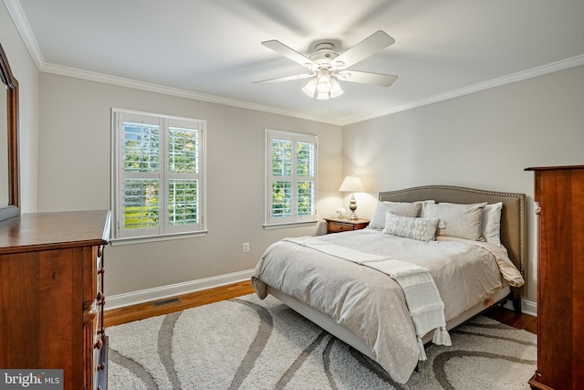 201 Ivystone Dr, Downingtown, PA 19335 - bedroom with ornamental molding, wood finished floors, baseboards, and a ceiling fan
