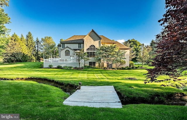 201 Ivystone Dr, Downingtown, PA 19335 - back of property with stucco siding and a yard