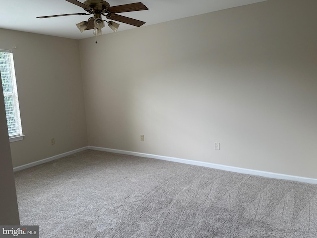 11002 Koman Cir, Manassas, VA 20109 - empty room featuring carpet, ceiling fan, and baseboards