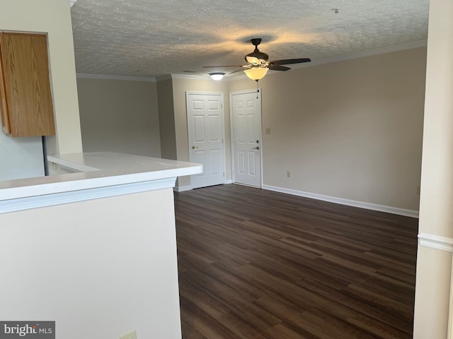 11002 Koman Cir, Manassas, VA 20109 - unfurnished room with ceiling fan, dark wood-style flooring, baseboards, a textured ceiling, and ornamental molding