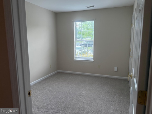 11002 Koman Cir, Manassas, VA 20109 - carpeted empty room featuring baseboards