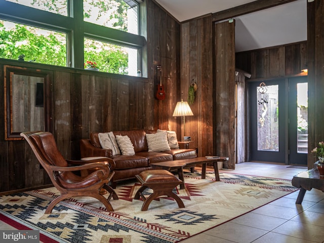 5607 Meridian Rd, Gibsonia, PA 15044 - living area featuring wooden walls, lofted ceiling, and tile patterned flooring