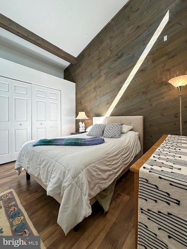 5607 Meridian Rd, Gibsonia, PA 15044 - bedroom featuring wood walls, a closet, high vaulted ceiling, wood finished floors, and beam ceiling