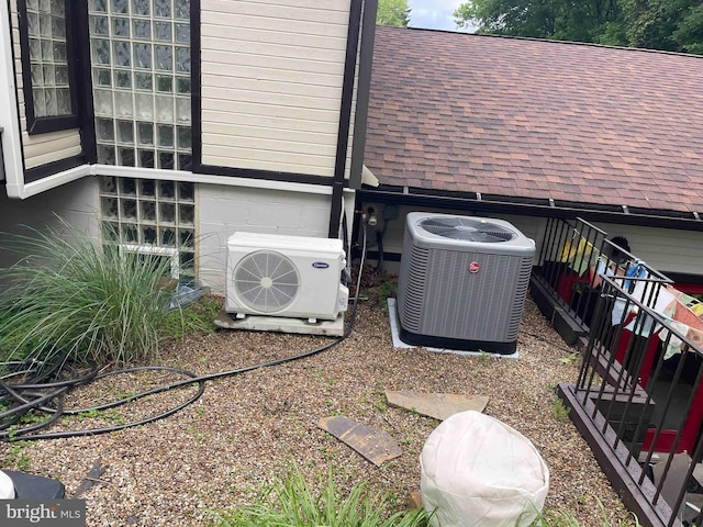 5607 Meridian Rd, Gibsonia, PA 15044 - exterior view of roof with shingles and a central AC unit