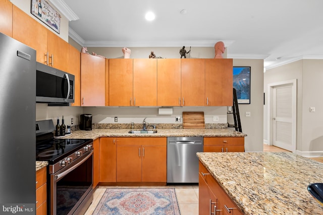 2007 Clipper Park Rd Unit 114, Baltimore, MD 21211 - kitchen featuring stainless steel appliances, a sink, crown molding, light stone counters, and light tile patterned flooring
