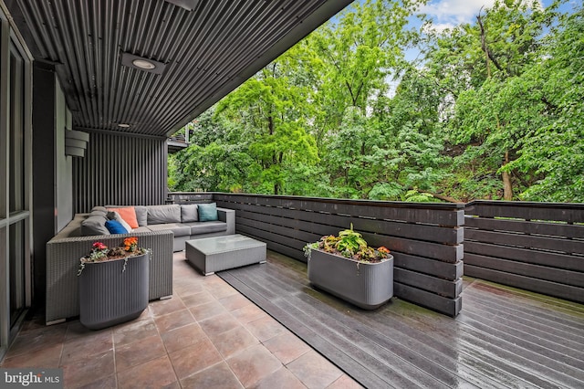 2007 Clipper Park Rd Unit 114, Baltimore, MD 21211 - wooden deck featuring an outdoor living space