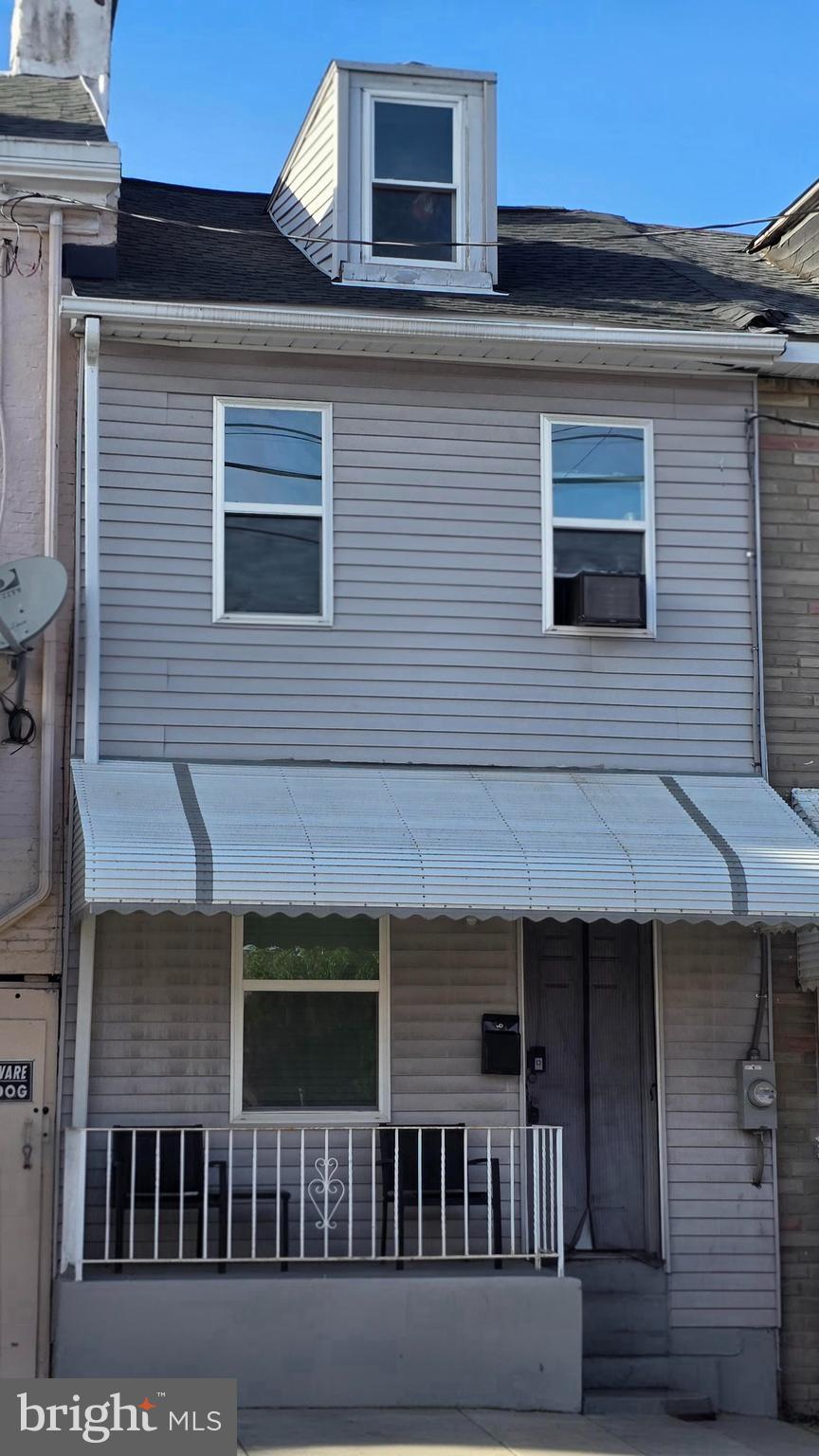 431 Buttonwood St, Reading, PA 19601 - view of front of home with roof with shingles