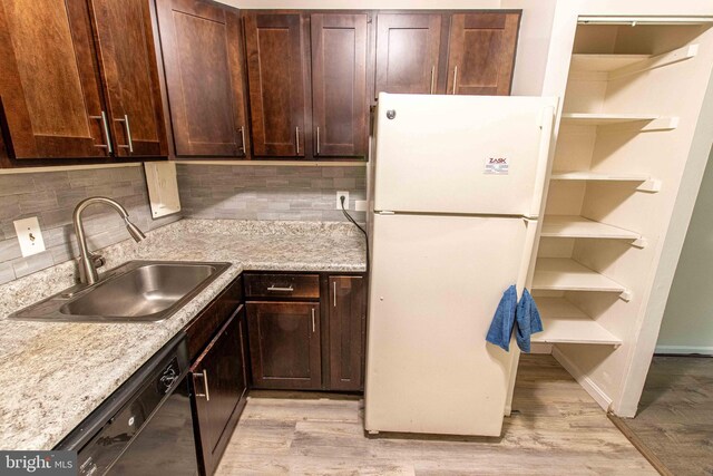 5 Canterbury Sq Unit 201, Alexandria, VA 22304 - kitchen featuring freestanding refrigerator, a sink, dishwasher, open shelves, and tasteful backsplash