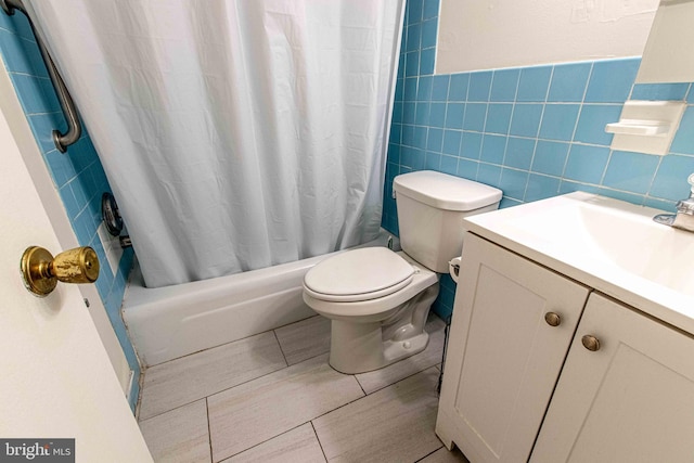 5 Canterbury Sq Unit 201, Alexandria, VA 22304 - full bath with toilet, vanity, shower / bath combo, and tile walls