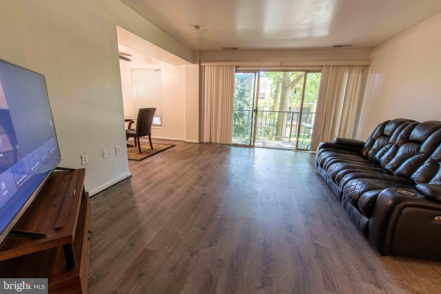 5 Canterbury Sq Unit 201, Alexandria, VA 22304 - living room with wood finished floors, baseboards, and a ceiling fan