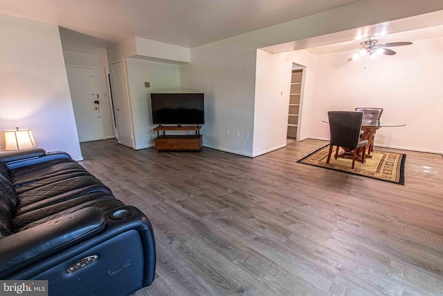 5 Canterbury Sq Unit 201, Alexandria, VA 22304 - living area with wood finished floors, a ceiling fan, and baseboards