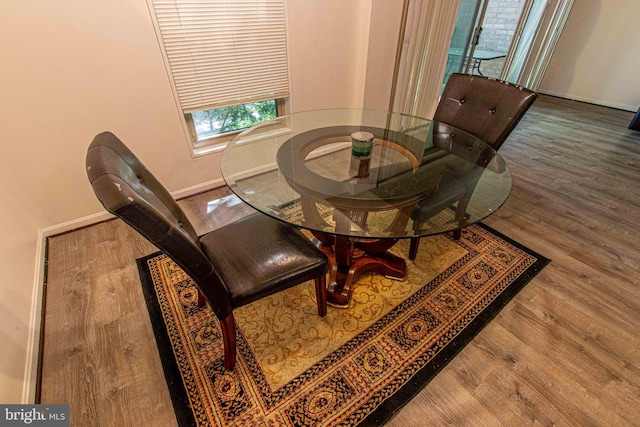 5 Canterbury Sq Unit 201, Alexandria, VA 22304 - dining room featuring wood finished floors and baseboards