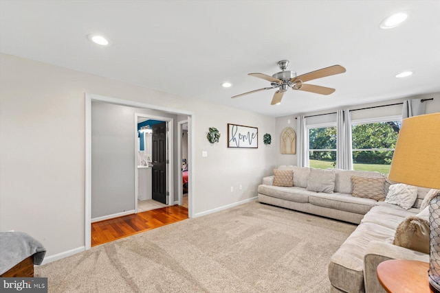 34602 Roxana Rd, Frankford, DE 19945 - carpeted living room with baseboards, a ceiling fan, and recessed lighting