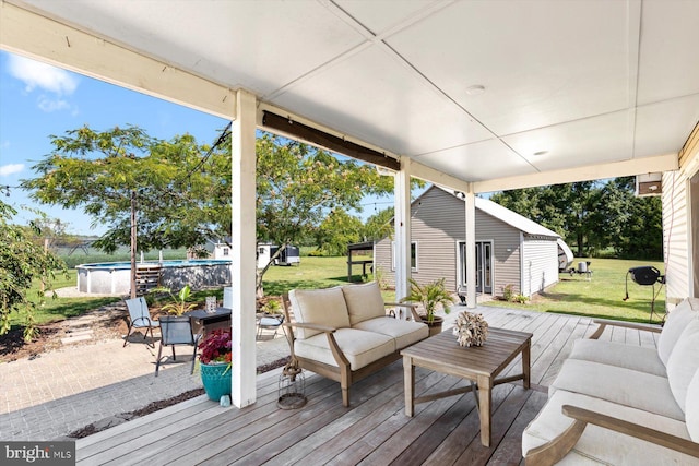 34602 Roxana Rd, Frankford, DE 19945 - wooden terrace with an outdoor pool, an outdoor living space, and a yard