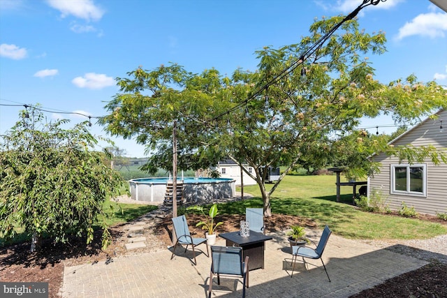 34602 Roxana Rd, Frankford, DE 19945 - view of patio featuring an outdoor pool