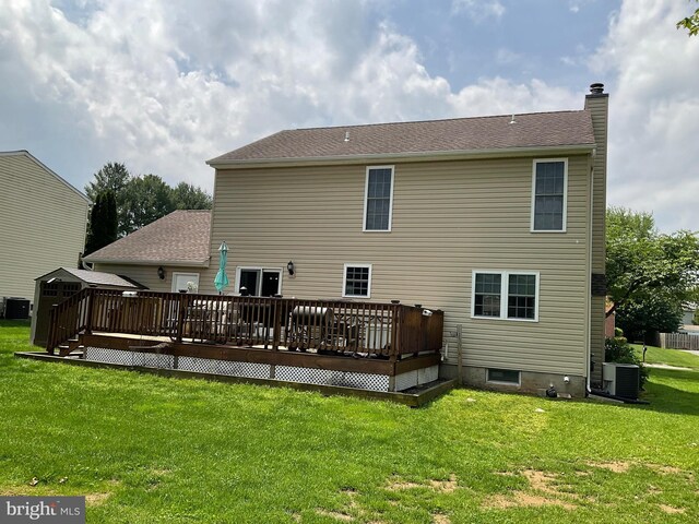 1345 Sweetbriar Ln, Bel Air, MD 21014 - rear view of house featuring central air condition unit, a chimney, a wooden deck, and a yard