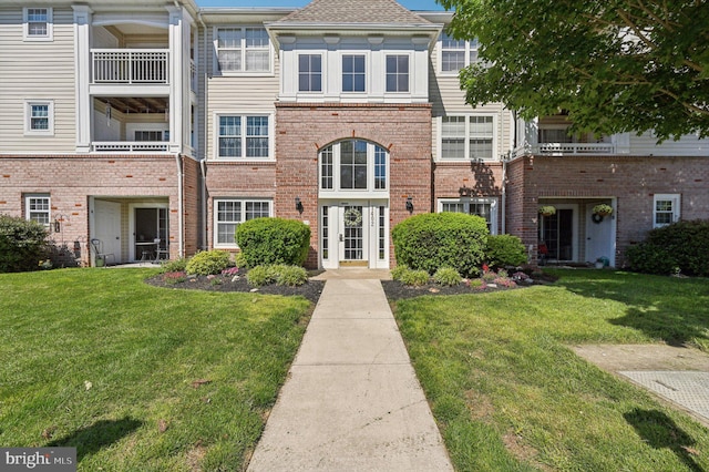 1402 Bonnett Pl Unit 131, Bel Air, MD 21015 - multi unit property with a front yard and brick siding