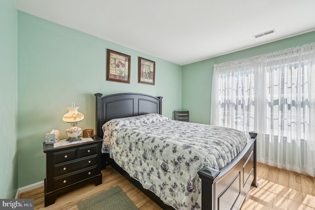 1402 Bonnett Pl Unit 131, Bel Air, MD 21015 - bedroom with baseboards and light wood-type flooring