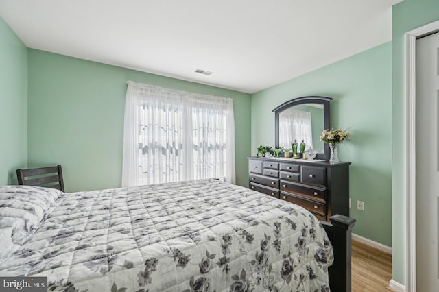 1402 Bonnett Pl Unit 131, Bel Air, MD 21015 - bedroom with wood finished floors and baseboards